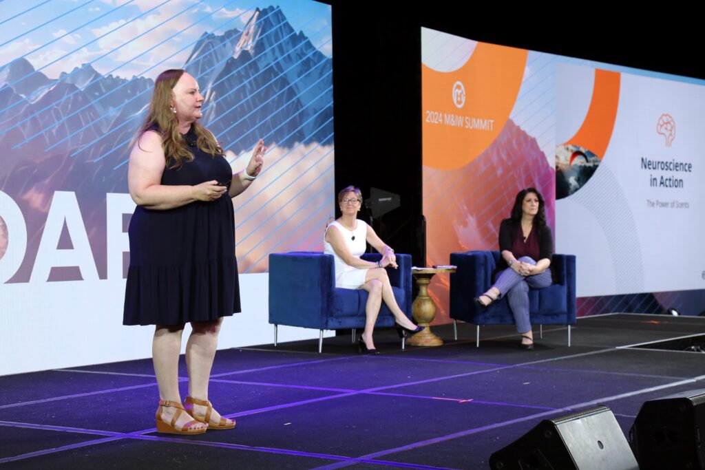 Elizabeth Muth, CMP; Marie Johnson, CMP; and Jeanette Davis present onstage at the 2024 M&IW Summit