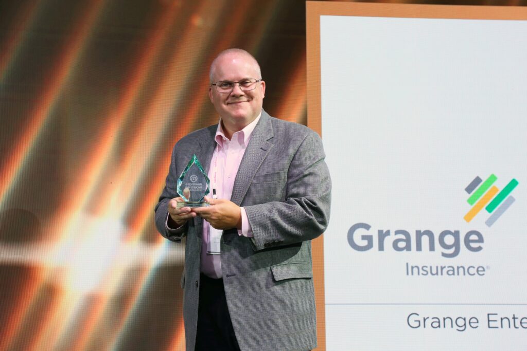 Bryan Fry accepting the Moxie Award for Grange