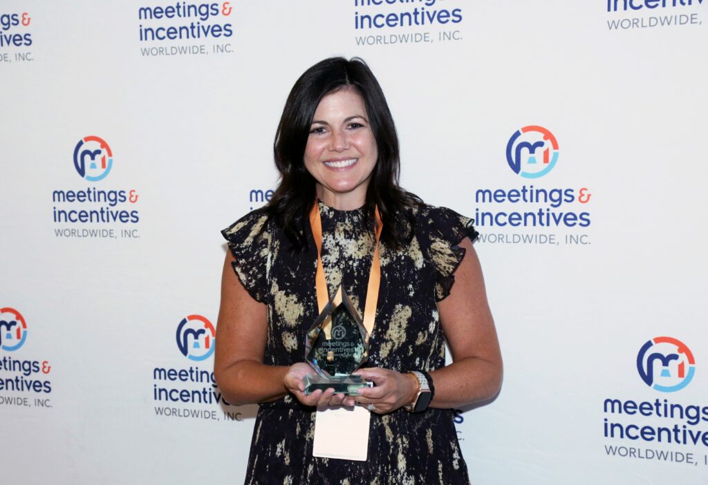 Nicole Gore accepting the Moxie Award for Hyatt