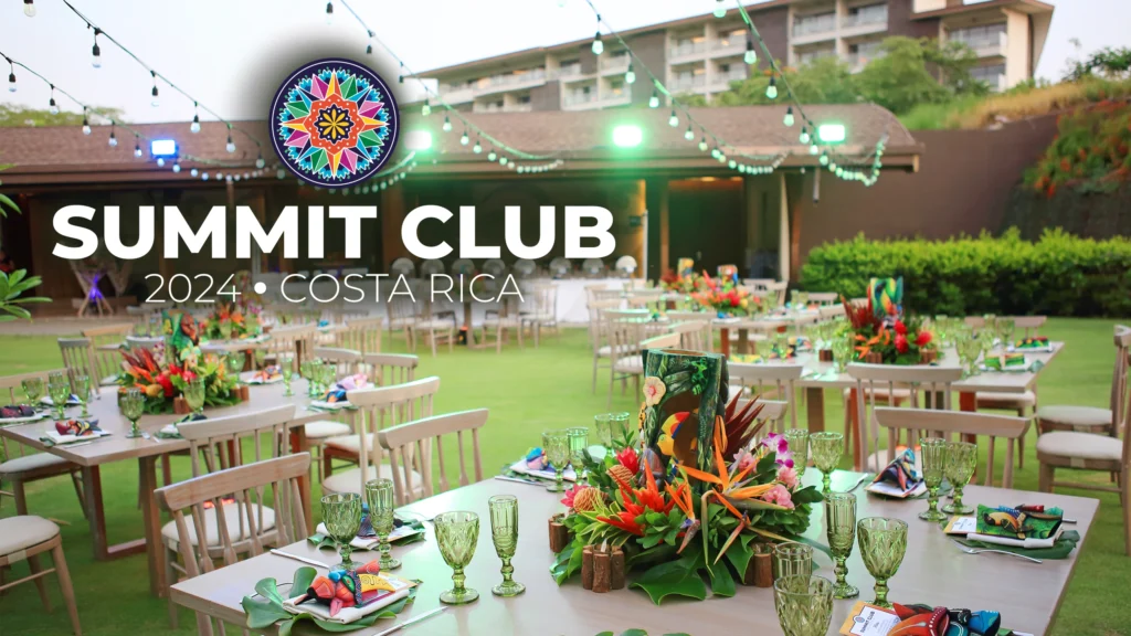 Photo of a beautiful table setting at the Summit Club event in Costa Rica with the Summit Club logo overlaying the photo