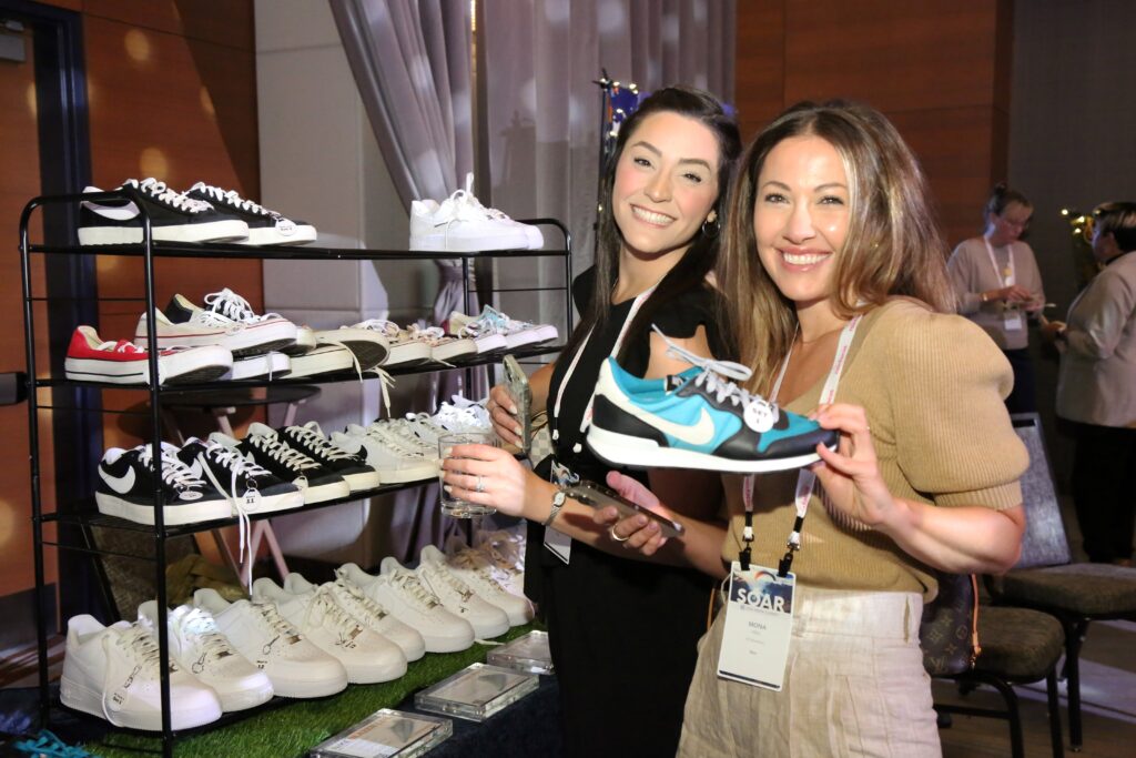 Attendees customize sneakers at the 2024 M&IW Summit