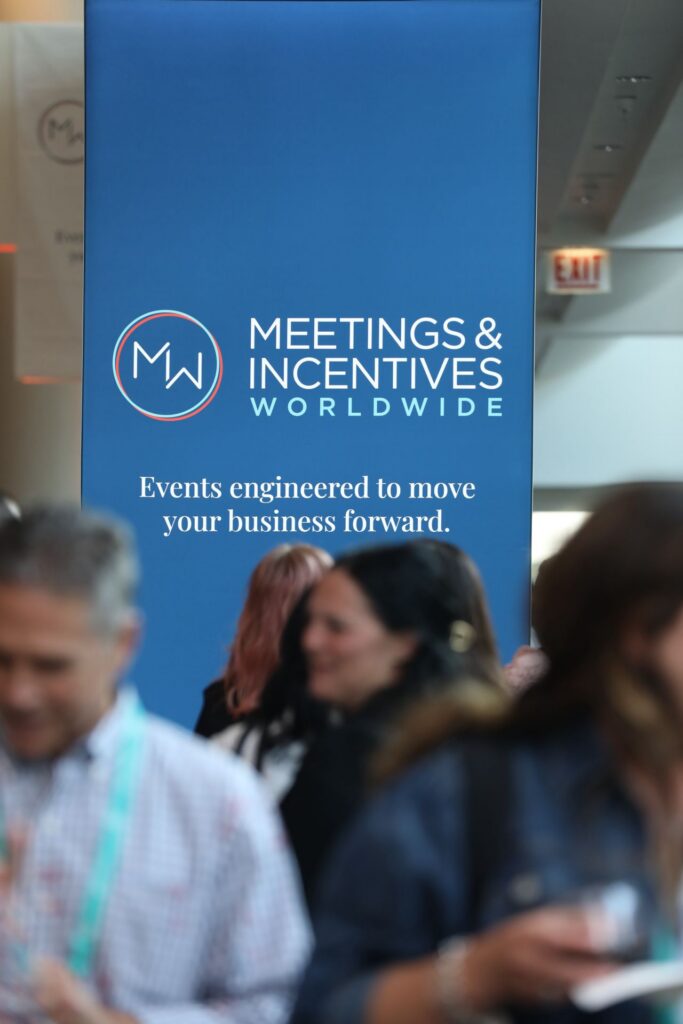 The new M&IW logo and tagline displayed at the 2026 M&IW Summit
