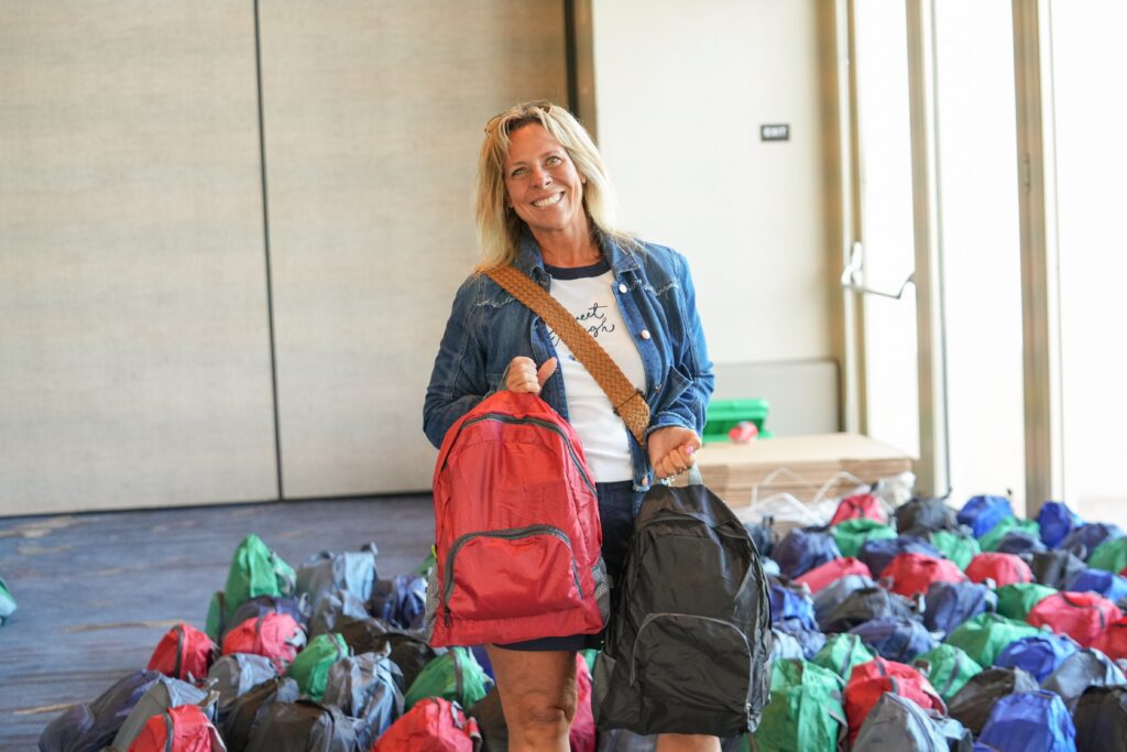 Attendee shows off all the emergency readiness kits